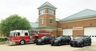 fire-truck-and-cruisers-with-building-cropped